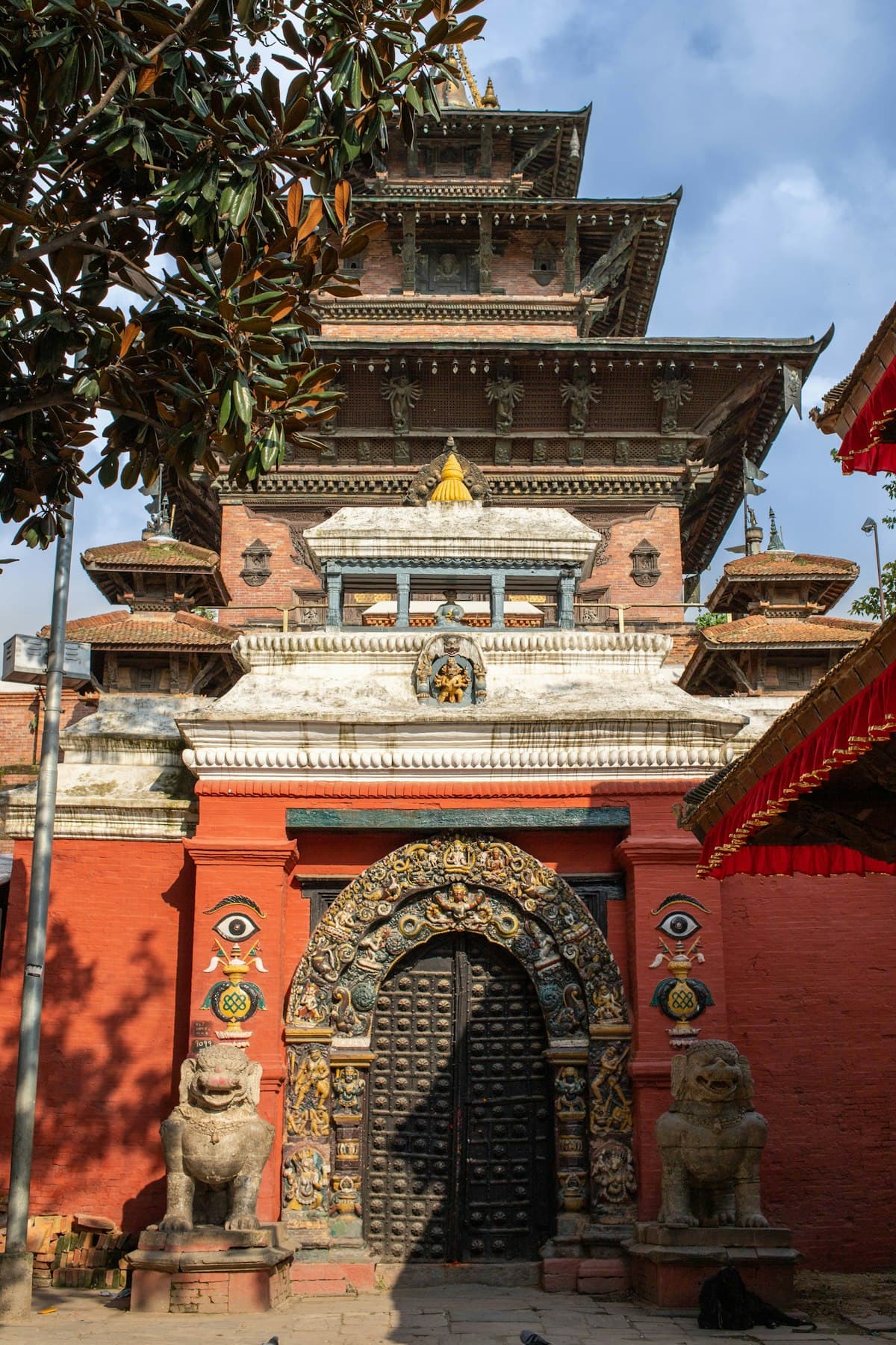 Temple entrance with statues at Kathmandu Durbar Square