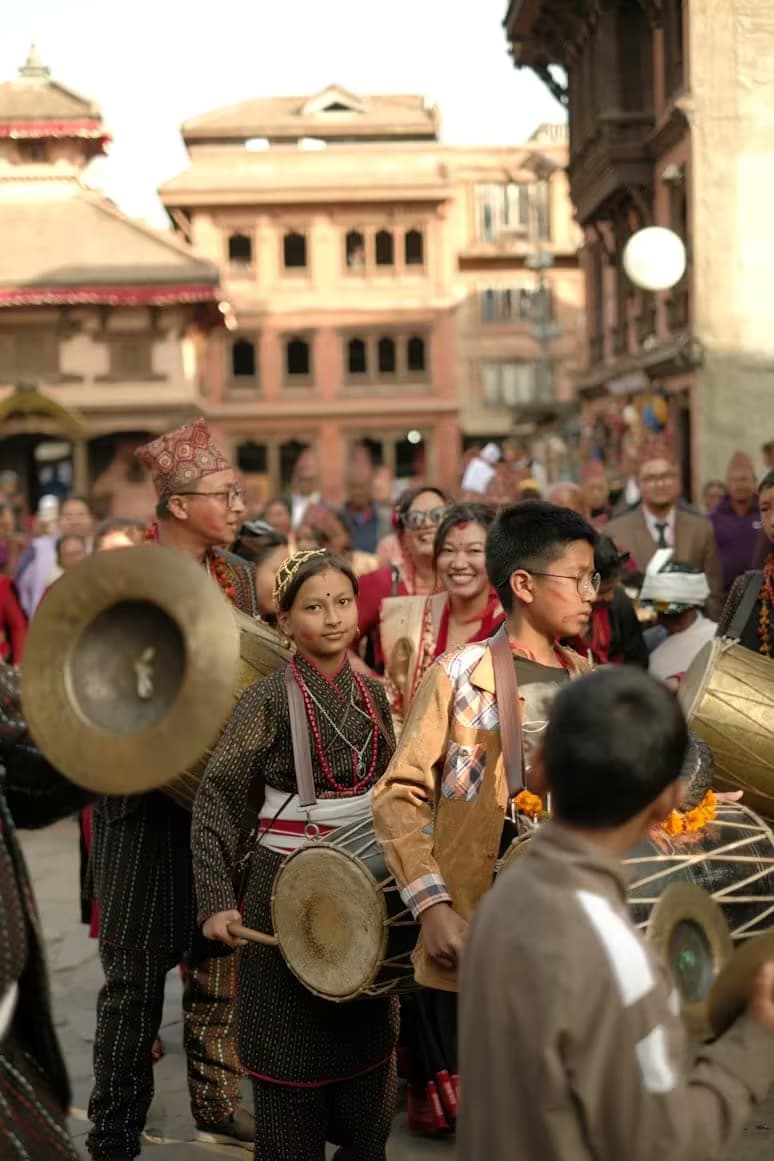 Newari musicians playing traditional drums and cymbals