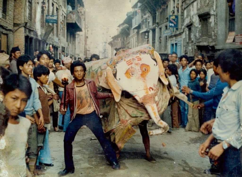 Pulu Kisi the white elephant charging down a Kathmandu street, from an older photograph